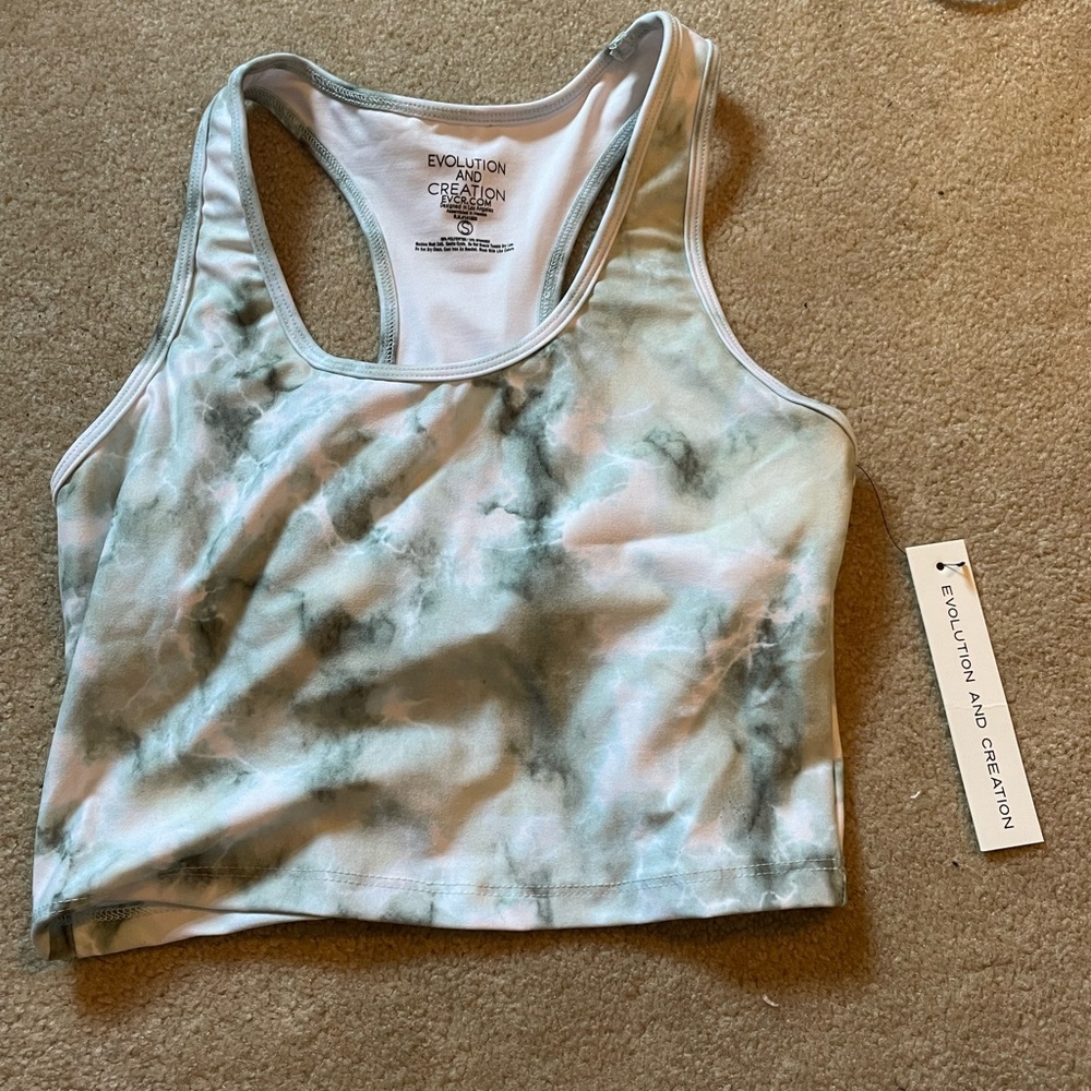 I am selling an athletic tank top. It is a size small